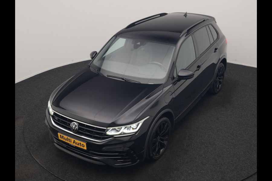 Volkswagen Tiguan 1.4 TSI eHybrid R-Line Business PHEV 245pk | Trekhaak Af Fabriek | Adaptive Cruise | IQ Light | Camera | Lederen Sportstoelen Memory & Verwarmd | Sfeerverlichting | Stuur Verwarmd | Apple Carplay | Navigatie | DAB | 20"L.M | Plug In Hybrid |