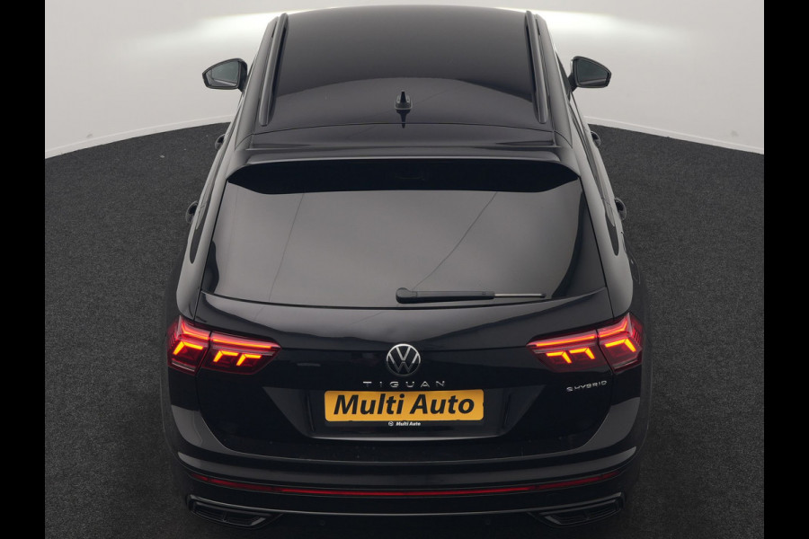 Volkswagen Tiguan 1.4 TSI eHybrid R-Line Business PHEV 245pk | Trekhaak Af Fabriek | Adaptive Cruise | IQ Light | Camera | Lederen Sportstoelen Memory & Verwarmd | Sfeerverlichting | Stuur Verwarmd | Apple Carplay | Navigatie | DAB | 20"L.M | Plug In Hybrid |