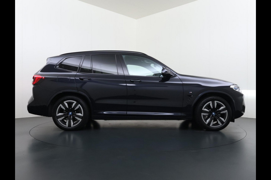 BMW iX3 High Executive 80 kWh M Sport | SOH 100% | Harman/Kardon | Panorama | Memory Seats | 360° Camera | Head-Up Display | Adaptive Cruise | Leder | Stoelverwarming | All-in incl. 12 mnd BOVAG |