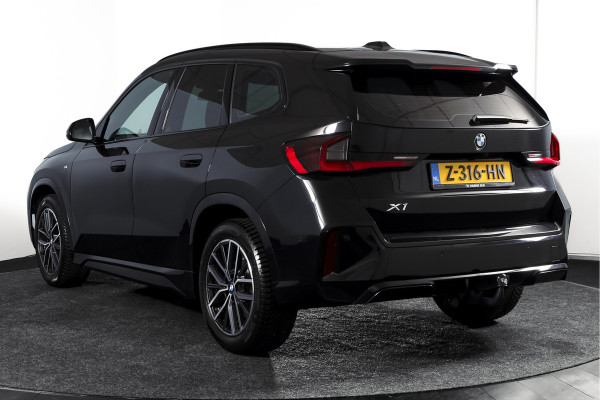 BMW X1 sDrive18i 136 PK | M-Sport | Afn. Trekhaak | Dig. Cockpit | Cruise | PDC | Camera | NAV + App. Connect | ECC | Elek. Klep | LM 18" |