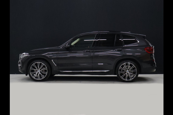 BMW X3 xDrive30e High Executive [SCHUIFKANTELDAK, APPLE CARPLAY, ANDROID, TREKHAAK, ADAPTIVE LED, STOELVERWARMING, VOL LEDER, DIGITAL DASH, ELEKTRISCHE ACHTERKLEP, GROOT NAVIGATIE, PDC V+A, CRUISE CONTROL, CLIMATE CONTROL,