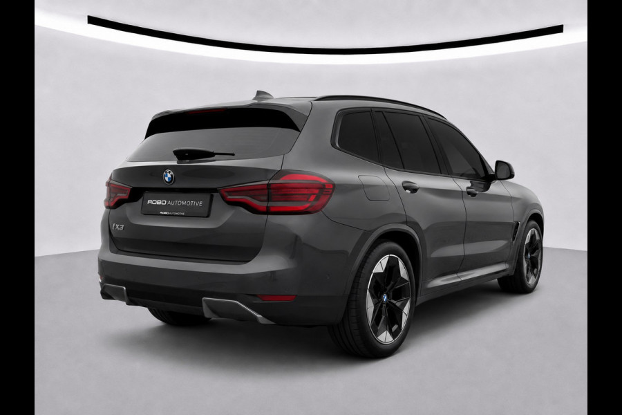 BMW iX3 High Executive 80 kWh | Panoramadak | Harman Kardon | Head-Up Display | Adaptive Cruise Control | Stoelverwarming | Dodehoekdetectie | Keyless | Trekhaak | Adaptief Onderstel | 360 Camera | Ambiance Verlichting |