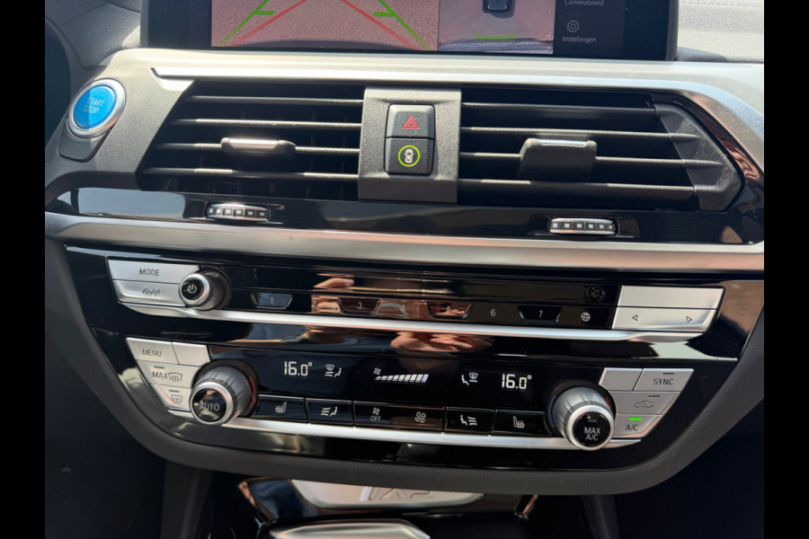 BMW iX3 High Executive 80 kWh | Panoramadak | Harman Kardon | Head-Up Display | Adaptive Cruise Control | Stoelverwarming | Dodehoekdetectie | Keyless | Trekhaak | Adaptief Onderstel | 360 Camera | Ambiance Verlichting |