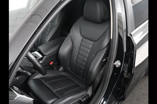 BMW 3 Serie Touring 318i Business Edition Plus | Leder | Stoelverwarming | Carplay | Virtueel dashboard | Cruise control | Climate control | Park assist | Full LED |