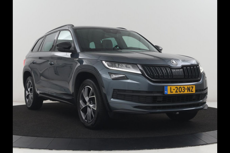 Škoda Kodiaq 1.5 TSI Sportline Business 7p. | Trekhaak | Memory | Stuur/stoel verwarming | Leder/alcantara | Carplay | Adaptive cruise | Camera | Park assist | Dodehoek detectie |
