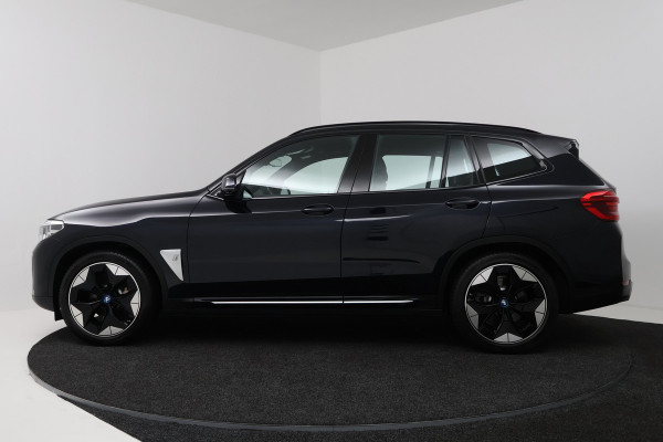 BMW iX3 High Executive 80 kWh SOH 97%(PANO, 360 CAMERA, H/K AUDIO, SFEERVERLICHTING, ADAPTIVE CRUISE, TREKHAAK, AUTOPILOT)