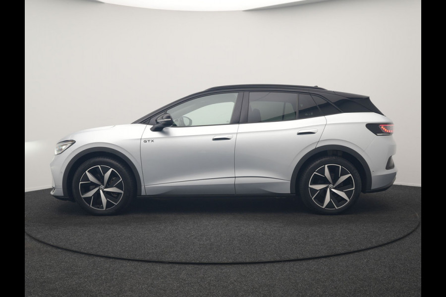 Volkswagen ID.4 GTX 4Motion 77 kWh 300pk Dealer O.H. | Trekhaak Af Fabriek | Panodak | Adaptive Cruise | Camera | IQ Light | Sportstoelen & Stuur Verwarmd | Keyless | Sfeerverlichting | Apple Carplay | Navigatie | DAB | 20"L.M |