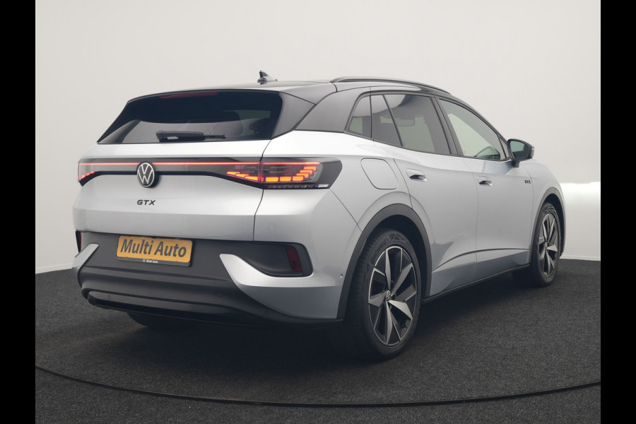 Volkswagen ID.4 GTX 4Motion 77 kWh 300pk Dealer O.H. | Trekhaak Af Fabriek | Panodak | Adaptive Cruise | Camera | IQ Light | Sportstoelen & Stuur Verwarmd | Keyless | Sfeerverlichting | Apple Carplay | Navigatie | DAB | 20"L.M |