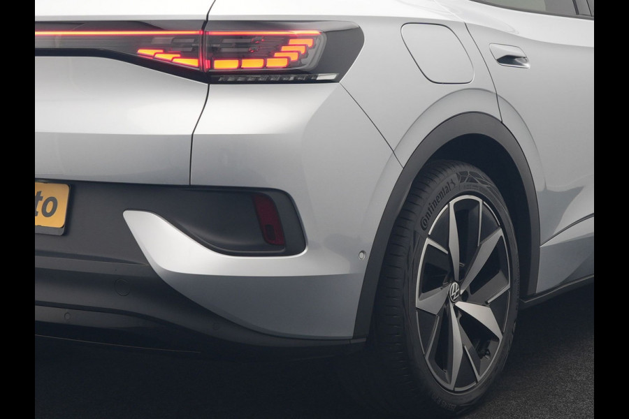 Volkswagen ID.4 GTX 4Motion 77 kWh 300pk Dealer O.H. | Trekhaak Af Fabriek | Panodak | Adaptive Cruise | Camera | IQ Light | Sportstoelen & Stuur Verwarmd | Keyless | Sfeerverlichting | Apple Carplay | Navigatie | DAB | 20"L.M |