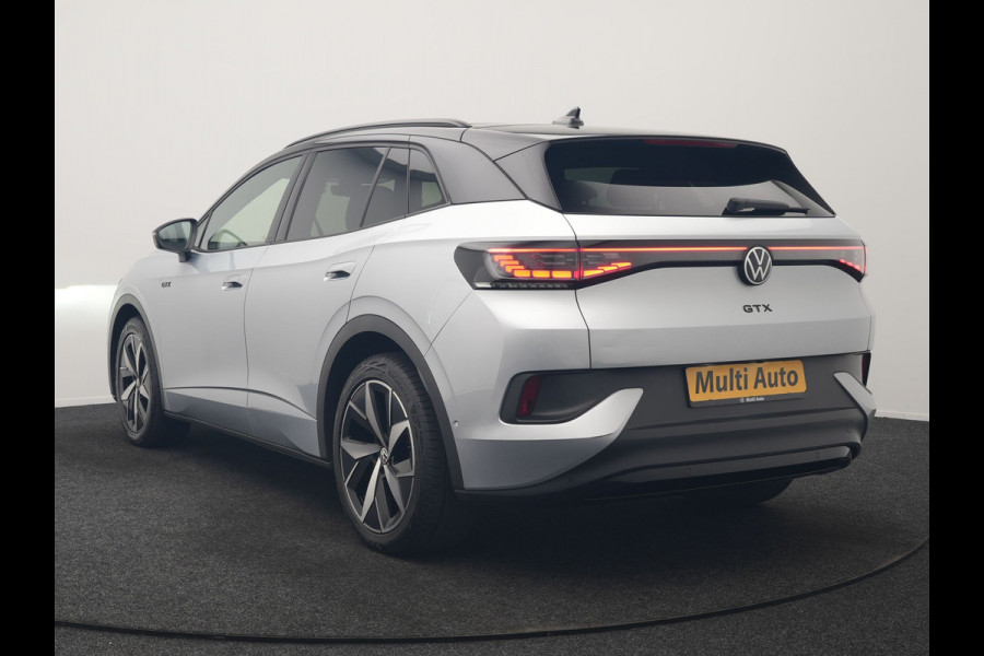 Volkswagen ID.4 GTX 4Motion 77 kWh 300pk Dealer O.H. | Trekhaak Af Fabriek | Panodak | Adaptive Cruise | Camera | IQ Light | Sportstoelen & Stuur Verwarmd | Keyless | Sfeerverlichting | Apple Carplay | Navigatie | DAB | 20"L.M |