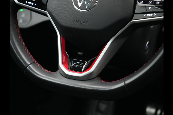 Volkswagen ID.4 GTX 4Motion 77 kWh 300pk Dealer O.H. | Trekhaak Af Fabriek | Panodak | Adaptive Cruise | Camera | IQ Light | Sportstoelen & Stuur Verwarmd | Keyless | Sfeerverlichting | Apple Carplay | Navigatie | DAB | 20"L.M |