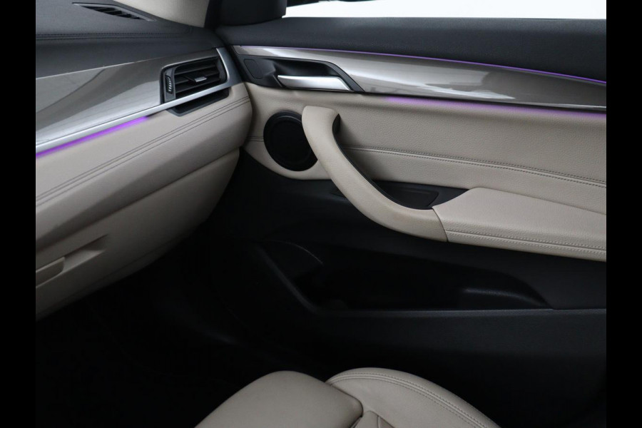 BMW X1 xDrive25e Business Edition Plus | SOH 91,4% | Panoramadak | Leder | Stoelverwarming | Sfeerverlichting | Cruise control | Navigatie | Park assist | PHEV