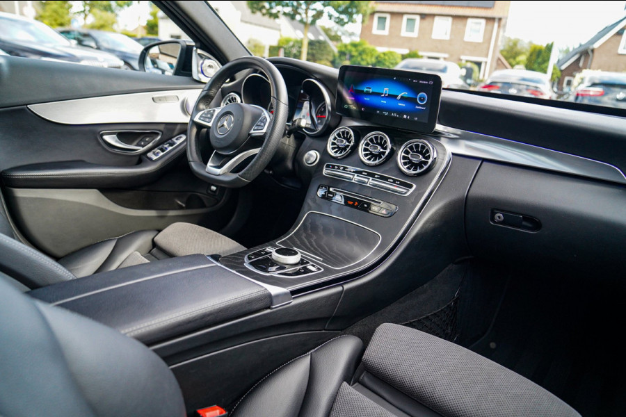 Mercedes-Benz C-Klasse 180 Sport Edition Premium Plus | Dubbele Panorama | AMG Pakket | Stoelverwarming | Xenon / LED | Sfeerverli