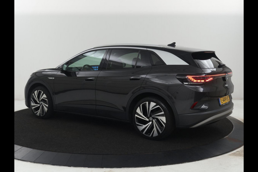 Volkswagen ID.4 First Max 77 kWh | SOH 91,9% | Panoramadak | Leder/alcantara | Memory | Stuur/stoel verwarming | Adaptive cruise | 360 camera | Dodehoek detectie | Carplay | Sfeerverlichting |