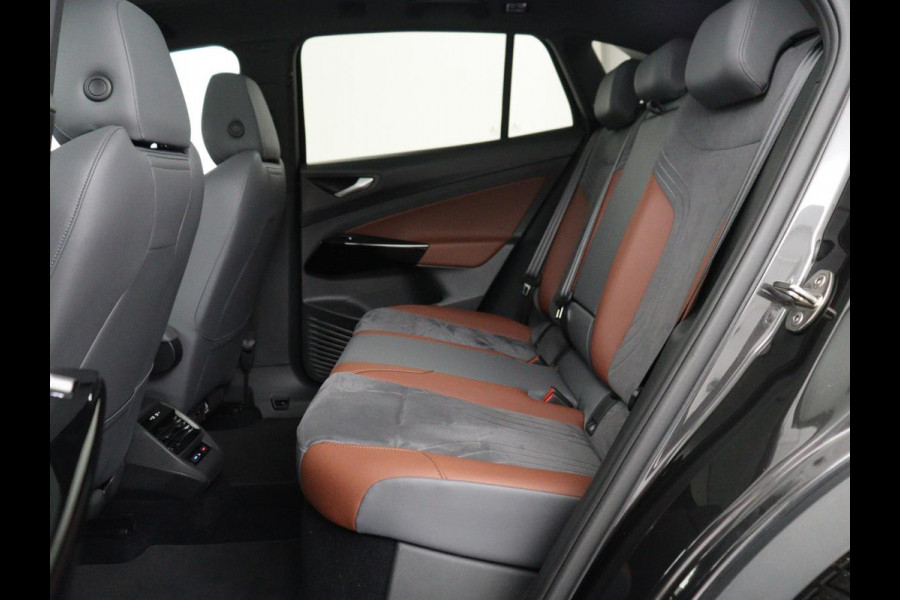 Volkswagen ID.4 First Max 77 kWh | SOH 91,9% | Panoramadak | Leder/alcantara | Memory | Stuur/stoel verwarming | Adaptive cruise | 360 camera | Dodehoek detectie | Carplay | Sfeerverlichting |