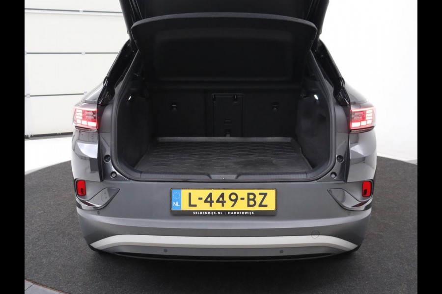 Volkswagen ID.4 First Max 77 kWh | SOH 91,9% | Panoramadak | Leder/alcantara | Memory | Stuur/stoel verwarming | Adaptive cruise | 360 camera | Dodehoek detectie | Carplay | Sfeerverlichting |