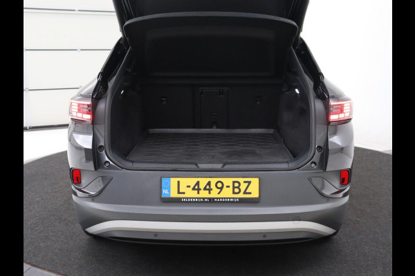 Volkswagen ID.4 First Max 77 kWh | SOH 91,9% | Panoramadak | Leder/alcantara | Memory | Stuur/stoel verwarming | Adaptive cruise | 360 camera | Dodehoek detectie | Carplay | Sfeerverlichting |