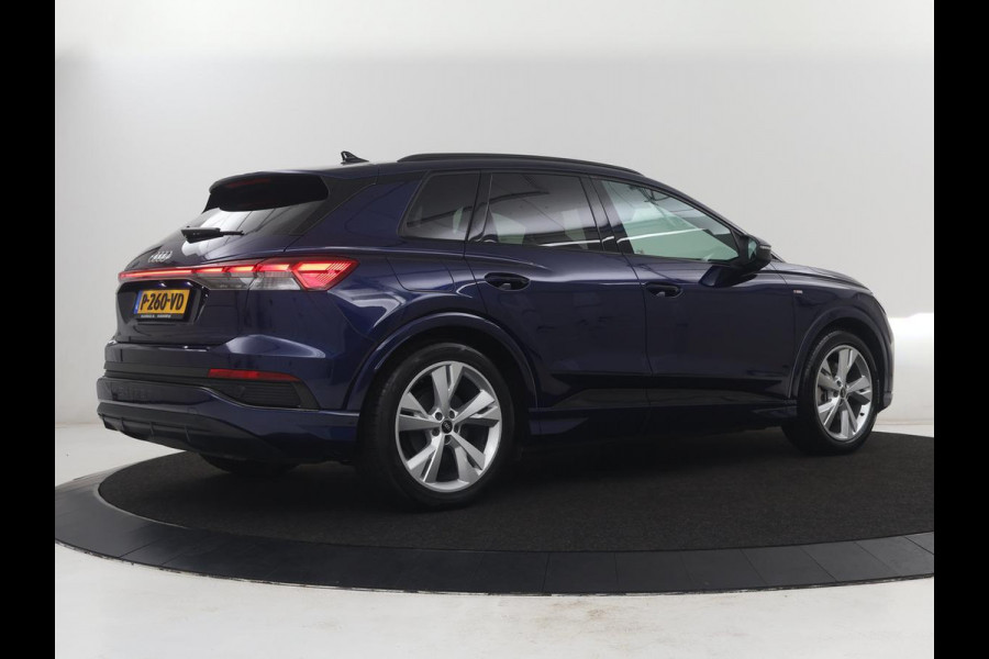 Audi Q4 e-tron 40 Launch edition S Competition 77 kWh | SOH 92,1% | Half leder | Stoelverwarming | Carplay | Adaptive cruise | Climate control | Camera | Park assist | Trekhaak