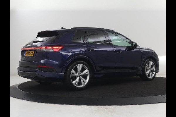 Audi Q4 e-tron 40 Launch edition S Competition 77 kWh | SOH 92,1% | Half leder | Stoelverwarming | Carplay | Adaptive cruise | Climate control | Camera | Park assist | Trekhaak