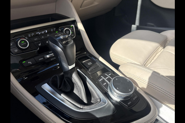 BMW 2 Serie Active Tourer 225xe iPerformance High Executive | PHEV | Panoramadak | Stoelverwarming | Leder | Head-Up | Navi