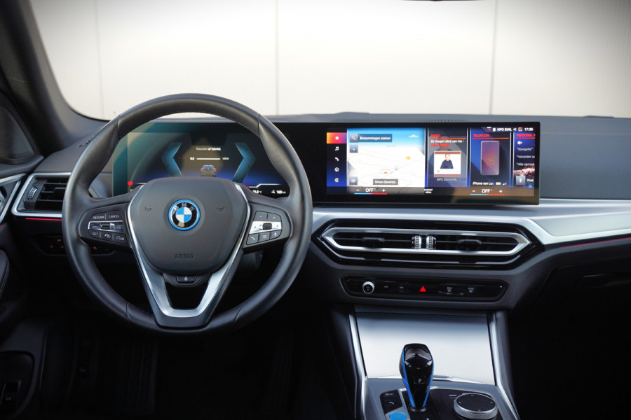 BMW i4 eDrive40 84 kWh | Stoelverwarming | Stuurverwarming | Apple Carplay | Adaptive Cruise Control | Memory Seat | Trekhaak | Camera | Parkeersensoren | Navigatie | Ambiance Verlichting | HIFI | SOH 96.52% |