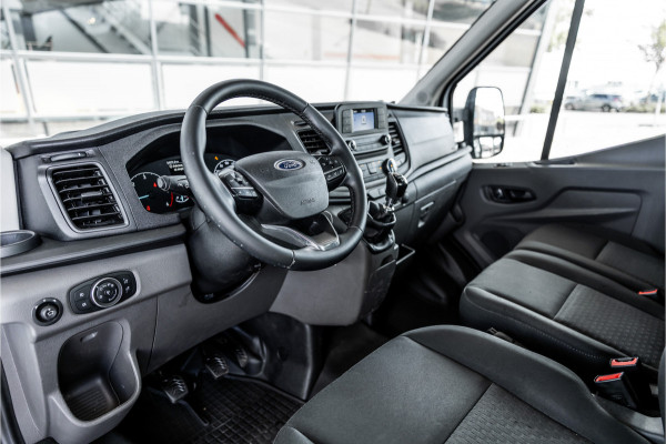 Ford Transit 310 2.0 TDCI L2H1 | Open laadbak | 3-Zitter | Cruise control | Airco | MF Stuur | Nieuwe APK | Dealer onderhouden | Euro 6