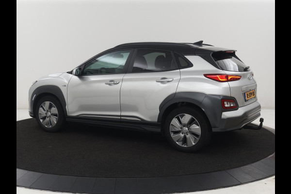 Hyundai Kona EV Fashion Design 64 kWh | SOH 94.6% | Leder | Head-up | Trekhaak | Adaptive cruise | Carplay | Stoelverwarming | Krell Sound | Dodehoek detectie |