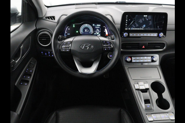Hyundai Kona EV Fashion Design 64 kWh | SOH 94.6% | Leder | Head-up | Trekhaak | Adaptive cruise | Carplay | Stoelverwarming | Krell Sound | Dodehoek detectie |