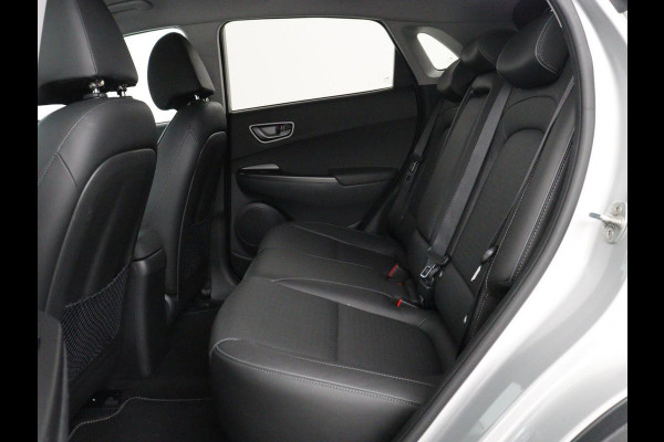 Hyundai Kona EV Fashion Design 64 kWh | SOH 94.6% | Leder | Head-up | Trekhaak | Adaptive cruise | Carplay | Stoelverwarming | Krell Sound | Dodehoek detectie |