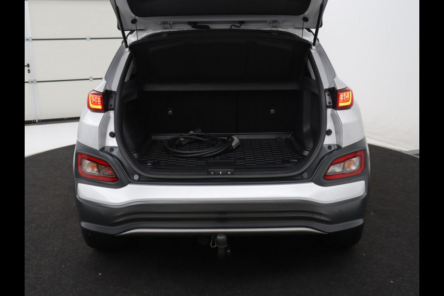 Hyundai Kona EV Fashion Design 64 kWh | SOH 94.6% | Leder | Head-up | Trekhaak | Adaptive cruise | Carplay | Stoelverwarming | Krell Sound | Dodehoek detectie |