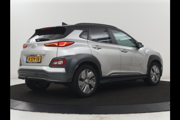 Hyundai Kona EV Fashion Design 64 kWh | SOH 94.6% | Leder | Head-up | Trekhaak | Adaptive cruise | Carplay | Stoelverwarming | Krell Sound | Dodehoek detectie |