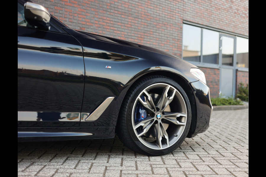 BMW 5 Serie Touring M550d xDrive | Pano - Trekhaak - HUD