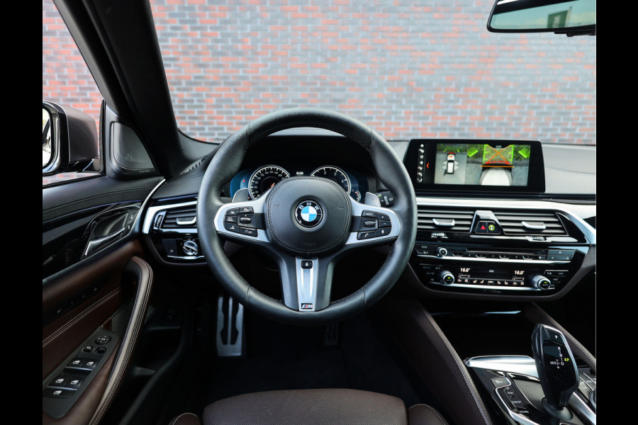 BMW 5 Serie Touring M550d xDrive | Pano - Trekhaak - HUD