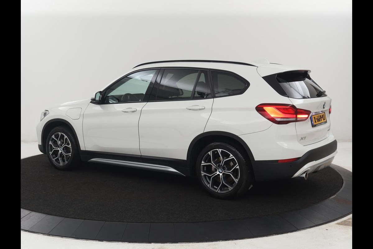 BMW X1 xDrive25e High Executive | SOH 85,2% | Half leder | Adaptive cruise | Stoelverwarming | Climate control | Navigatie | Camera | Park assist | Elektrische achterklep