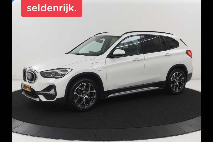 BMW X1 xDrive25e High Executive | SOH 85,2% | Half leder | Adaptive cruise | Stoelverwarming | Climate control | Navigatie | Camera | Park assist | Elektrische achterklep