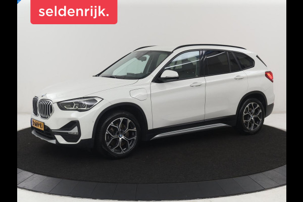 BMW X1 xDrive25e High Executive | SOH 85,2% | Half leder | Adaptive cruise | Stoelverwarming | Climate control | Navigatie | Camera | Park assist | Elektrische achterklep
