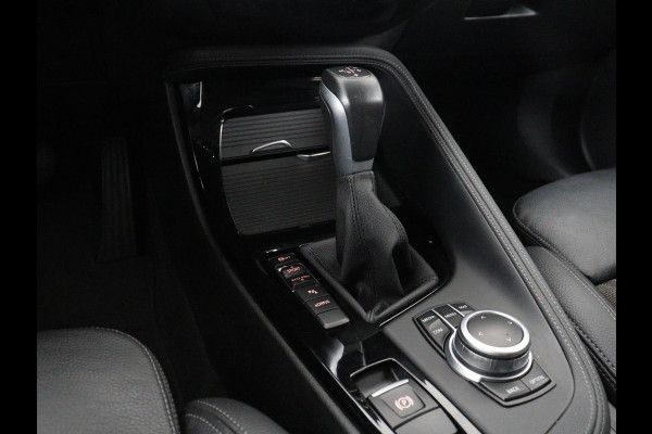 BMW X1 xDrive25e High Executive | SOH 85,2% | Half leder | Adaptive cruise | Stoelverwarming | Climate control | Navigatie | Camera | Park assist | Elektrische achterklep