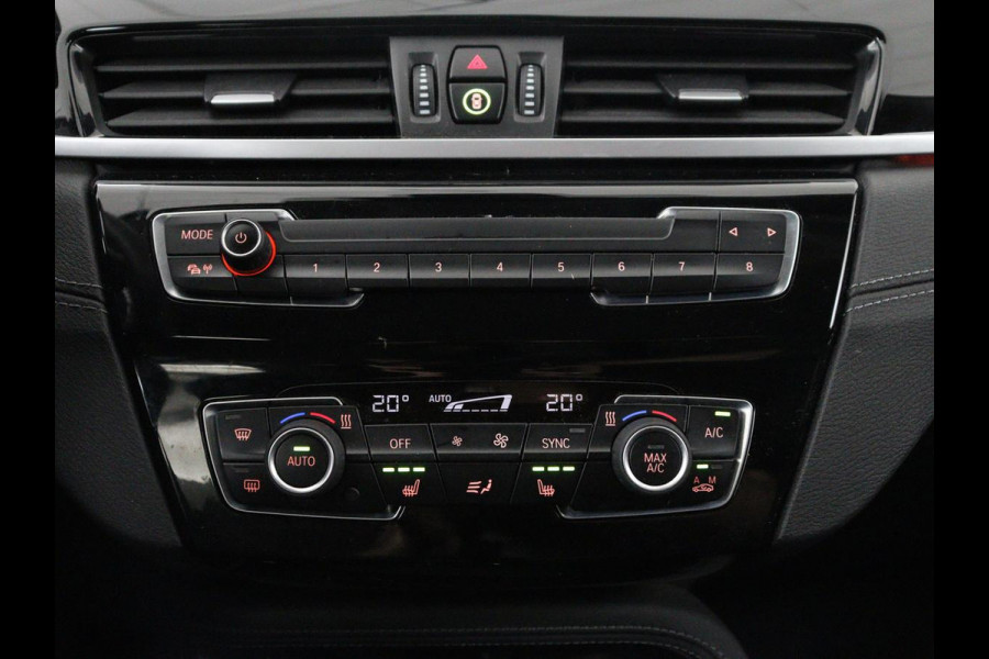 BMW X1 xDrive25e High Executive | SOH 85,2% | Half leder | Adaptive cruise | Stoelverwarming | Climate control | Navigatie | Camera | Park assist | Elektrische achterklep