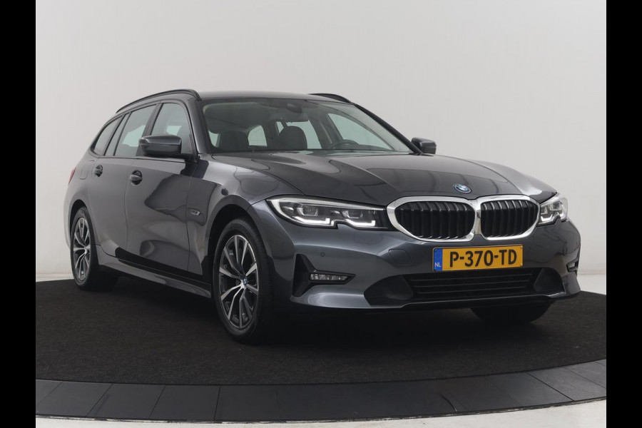 BMW 3 Serie Touring 320e Business Edition Plus | SOH 90% | Leder | Stoelverwarming | Carplay | Cruise control | Climate control | Elektrische achterklep | Park assist | PHEV