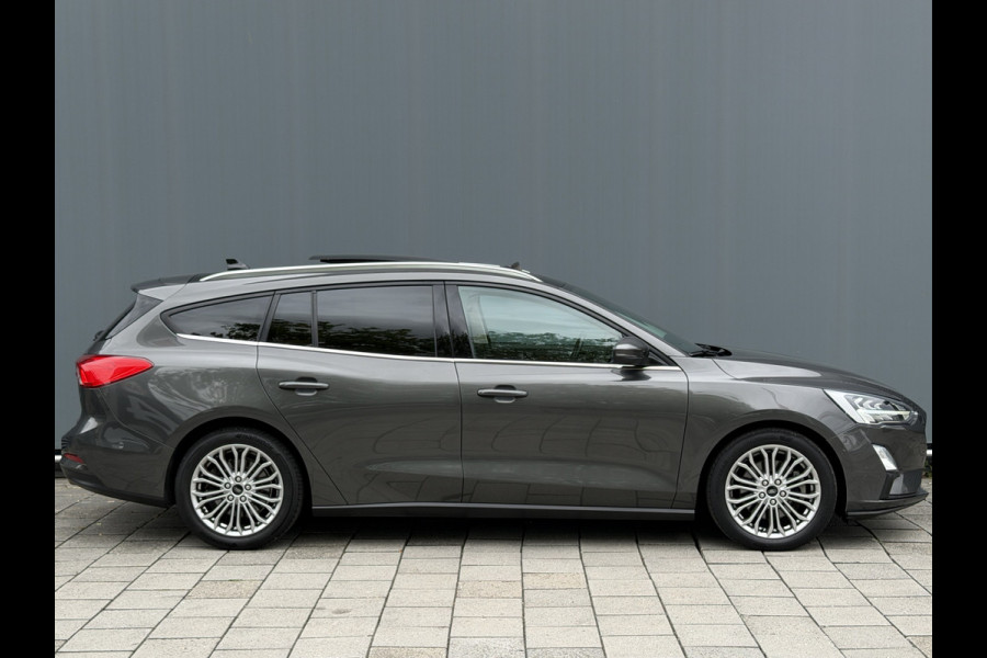 Ford FOCUS Wagon BWJ 2019 | 1.0T 126PK Titanium Bus AUTOMAAT | TREKHAAK | PANO DAK | LEER | LED | NAVI | CLIMA | STOEL&STUUR VERW | PDC | DONKER GLASS |