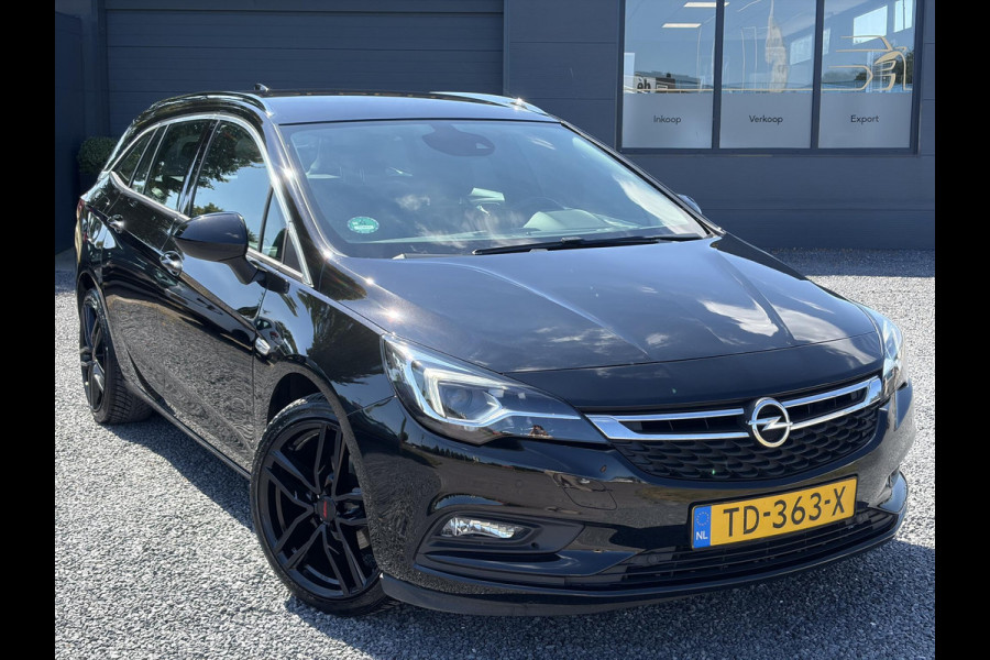 Opel Astra Sports Tourer 1.4 Business Executive 2e Eigenaar l 150pk l Carplay l Navi l Pdc V+A l Stoelvw-Stuurverw l Clima l Cruise l 18''Lmv l Halfleder l 6 Bak l Rijstrooksensor l N.A.P l Apk tot 08-2027