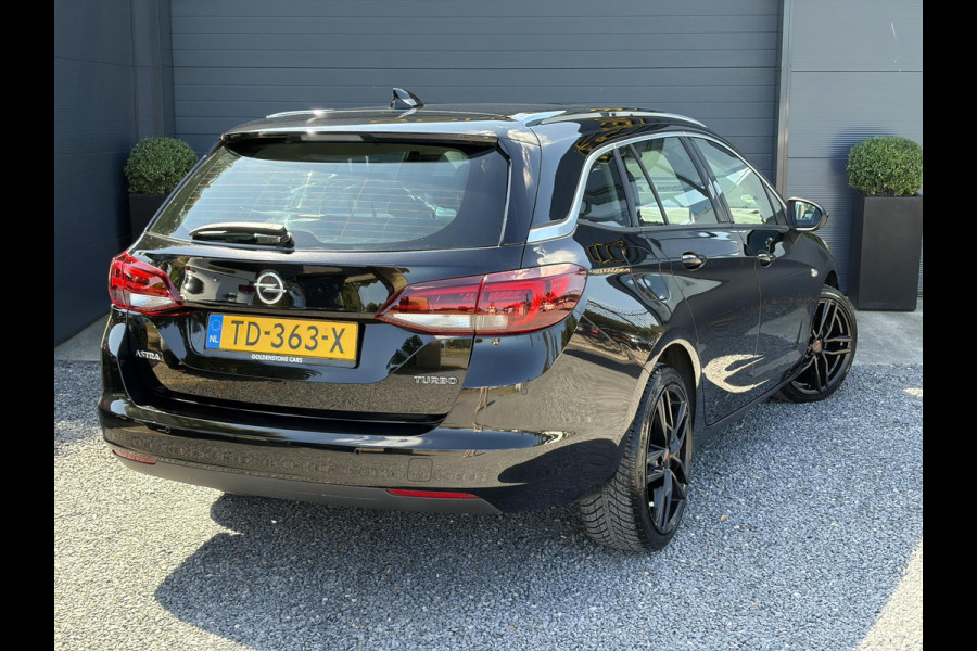 Opel Astra Sports Tourer 1.4 Business Executive 2e Eigenaar l 150pk l Carplay l Navi l Pdc V+A l Stoelvw-Stuurverw l Clima l Cruise l 18''Lmv l Halfleder l 6 Bak l Rijstrooksensor l N.A.P l Apk tot 08-2027