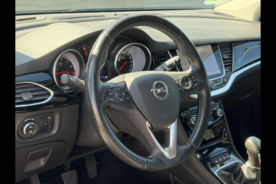 Opel Astra Sports Tourer 1.4 Business Executive 2e Eigenaar l 150pk l Carplay l Navi l Pdc V+A l Stoelvw-Stuurverw l Clima l Cruise l 18''Lmv l Halfleder l 6 Bak l Rijstrooksensor l N.A.P l Apk tot 08-2027