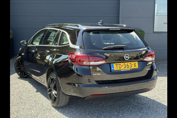 Opel Astra Sports Tourer 1.4 Business Executive 2e Eigenaar l 150pk l Carplay l Navi l Pdc V+A l Stoelvw-Stuurverw l Clima l Cruise l 18''Lmv l Halfleder l 6 Bak l Rijstrooksensor l N.A.P l Apk tot 08-2027