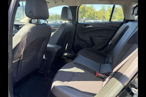 Opel Astra Sports Tourer 1.4 Business Executive 2e Eigenaar l 150pk l Carplay l Navi l Pdc V+A l Stoelvw-Stuurverw l Clima l Cruise l 18''Lmv l Halfleder l 6 Bak l Rijstrooksensor l N.A.P l Apk tot 08-2027