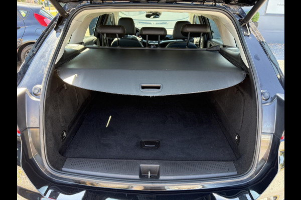 Opel Astra Sports Tourer 1.4 Business Executive 2e Eigenaar l 150pk l Carplay l Navi l Pdc V+A l Stoelvw-Stuurverw l Clima l Cruise l 18''Lmv l Halfleder l 6 Bak l Rijstrooksensor l N.A.P l Apk tot 08-2027