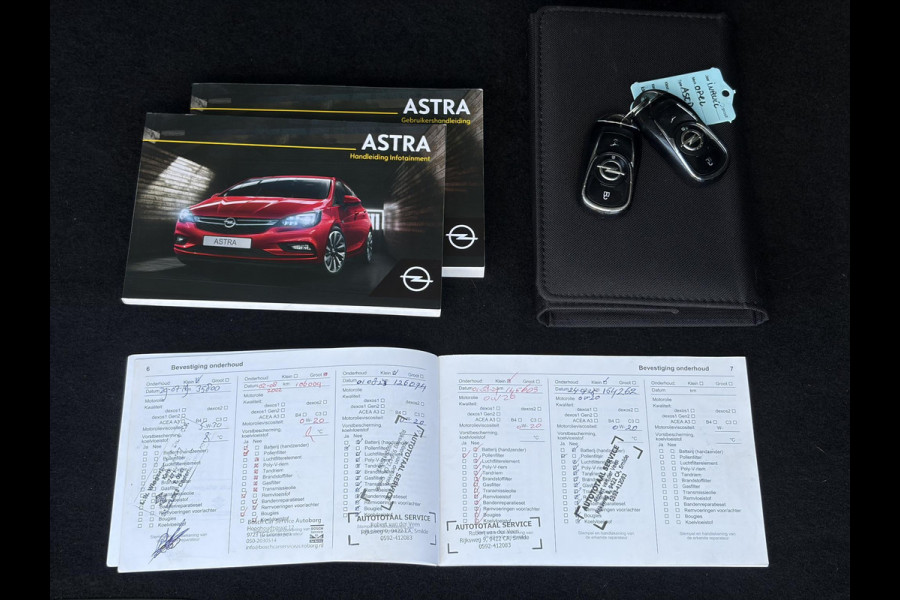 Opel Astra Sports Tourer 1.4 Business Executive 2e Eigenaar l 150pk l Carplay l Navi l Pdc V+A l Stoelvw-Stuurverw l Clima l Cruise l 18''Lmv l Halfleder l 6 Bak l Rijstrooksensor l N.A.P l Apk tot 08-2027