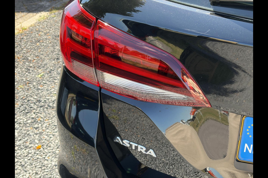 Opel Astra Sports Tourer 1.4 Business Executive 2e Eigenaar l 150pk l Carplay l Navi l Pdc V+A l Stoelvw-Stuurverw l Clima l Cruise l 18''Lmv l Halfleder l 6 Bak l Rijstrooksensor l N.A.P l Apk tot 08-2027
