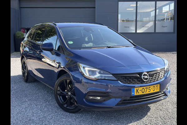 Opel Astra Sports Tourer 1.2 Ultimate 2e Eigenaar l Trekhaak l Camera l Carplay l Navi l Alcantara-Leder l 17''Lmv l Stoelverw-Stuurverw l Net beurt gehad l Dodehoek l Rijstrooksensor l Pdc V+A l 6 Bak l N.A.P l 146pk l Bj 11-2020 l Apk tot 08-2028