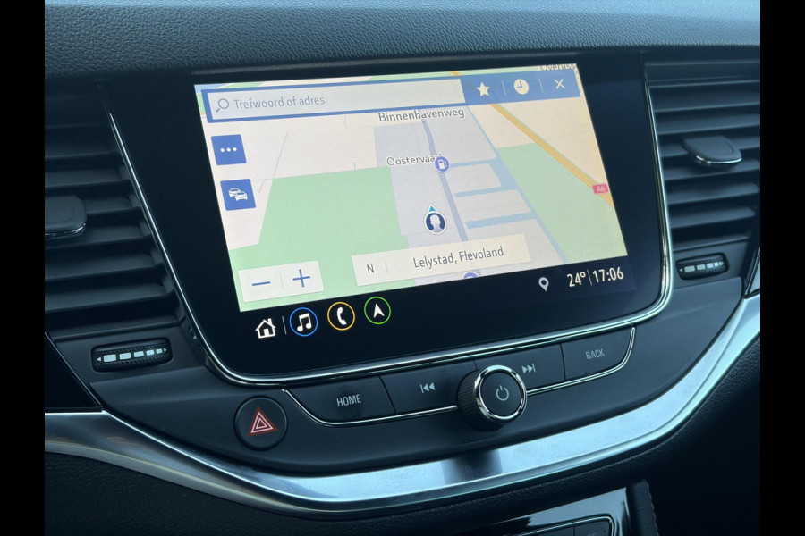 Opel Astra Sports Tourer 1.2 Ultimate 2e Eigenaar l Trekhaak l Camera l Carplay l Navi l Alcantara-Leder l 17''Lmv l Stoelverw-Stuurverw l Net beurt gehad l Dodehoek l Rijstrooksensor l Pdc V+A l 6 Bak l N.A.P l 146pk l Bj 11-2020 l Apk tot 08-2028